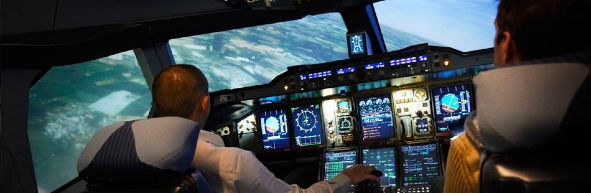 ProFlight pilots in the cockpit of an A380 at an angle.